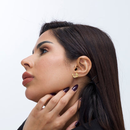 Arabic Calligraphy Ear Cuff – “I Am a Scream That Cannot Be Shut”